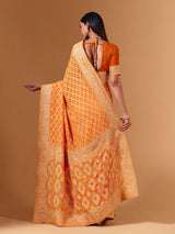 Orange georgette saree with bandhani print and zardosi embellishments