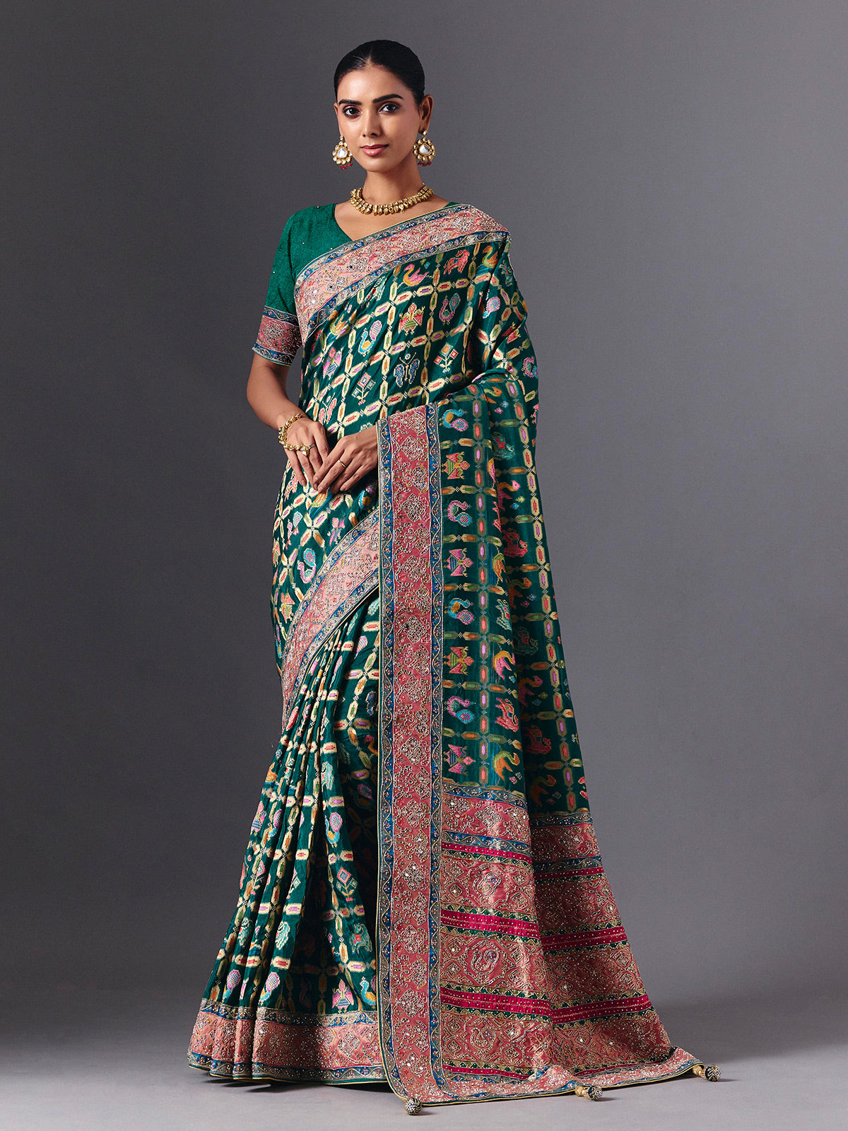 Rama green modal silk saree with mirror animal motif detailing