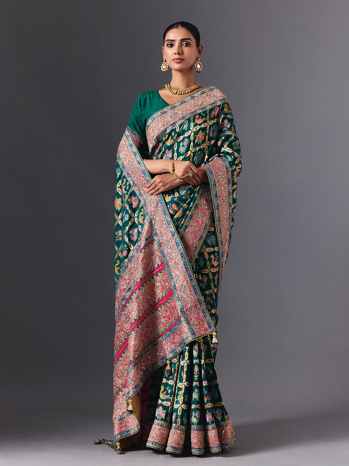 Rama green modal silk saree with mirror animal motif detailing