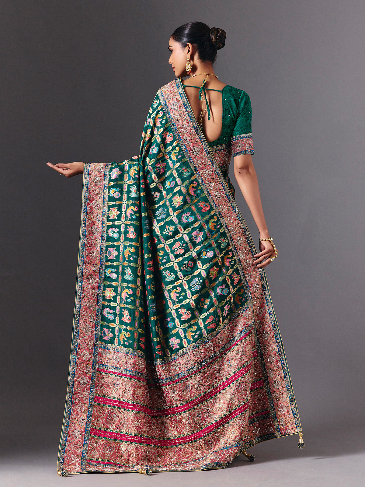 Rama green modal silk saree with mirror animal motif detailing