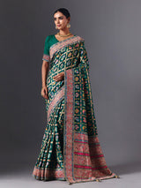 Rama green modal silk saree with mirror animal motif detailing