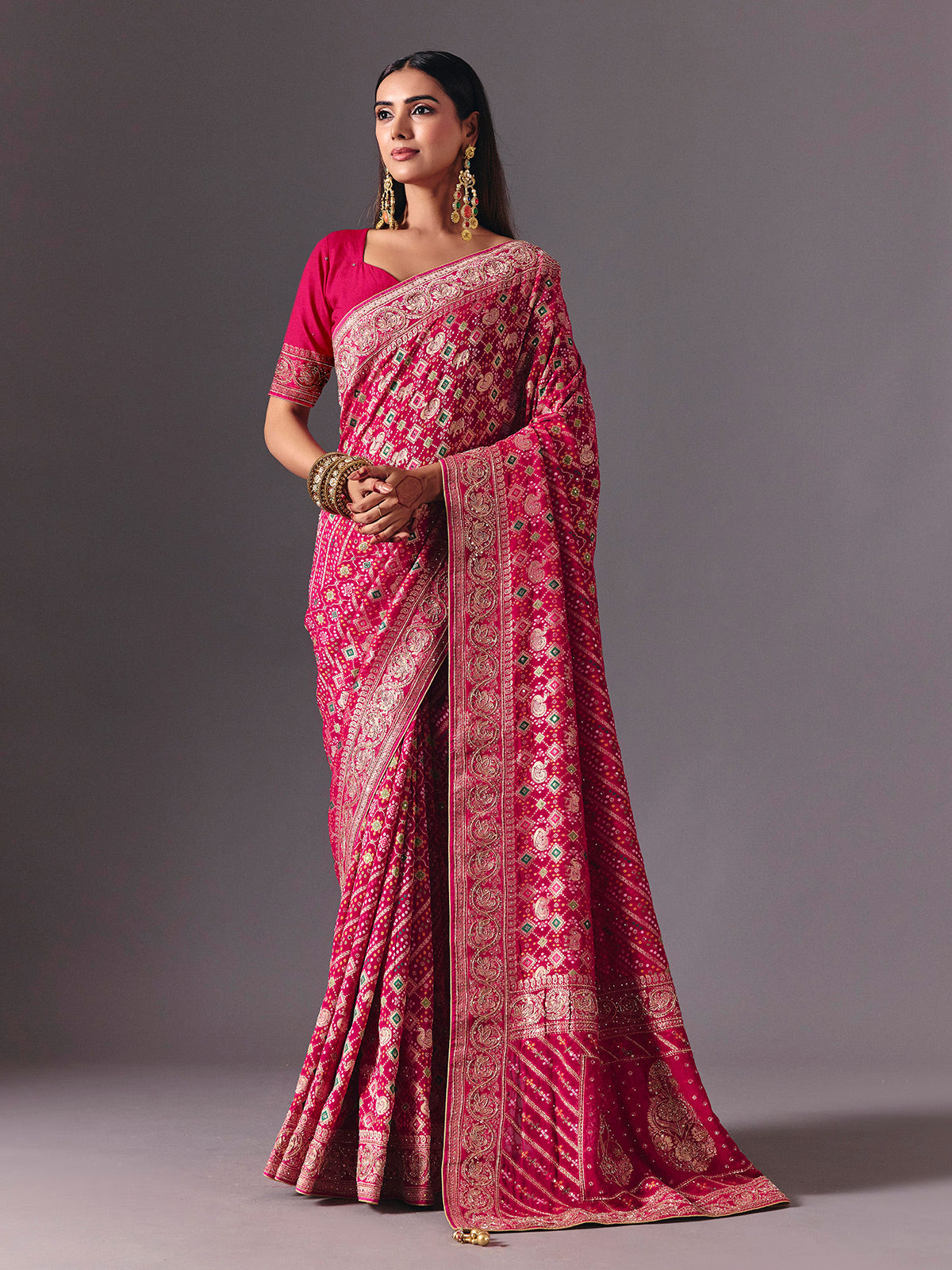 Rani pink dola silk saree with bandhani zari elegance