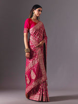 Rani pink dola silk saree with bandhani zari elegance