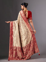 Beige shimmer dola silk saree with floral zari artistry