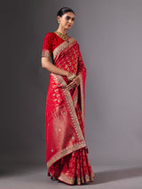 Red modal silk saree with delicate zari tassel detailing