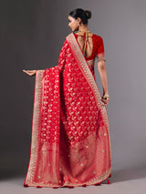 Red modal silk saree with delicate zari tassel detailing
