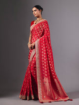 Red modal silk saree with delicate zari tassel detailing