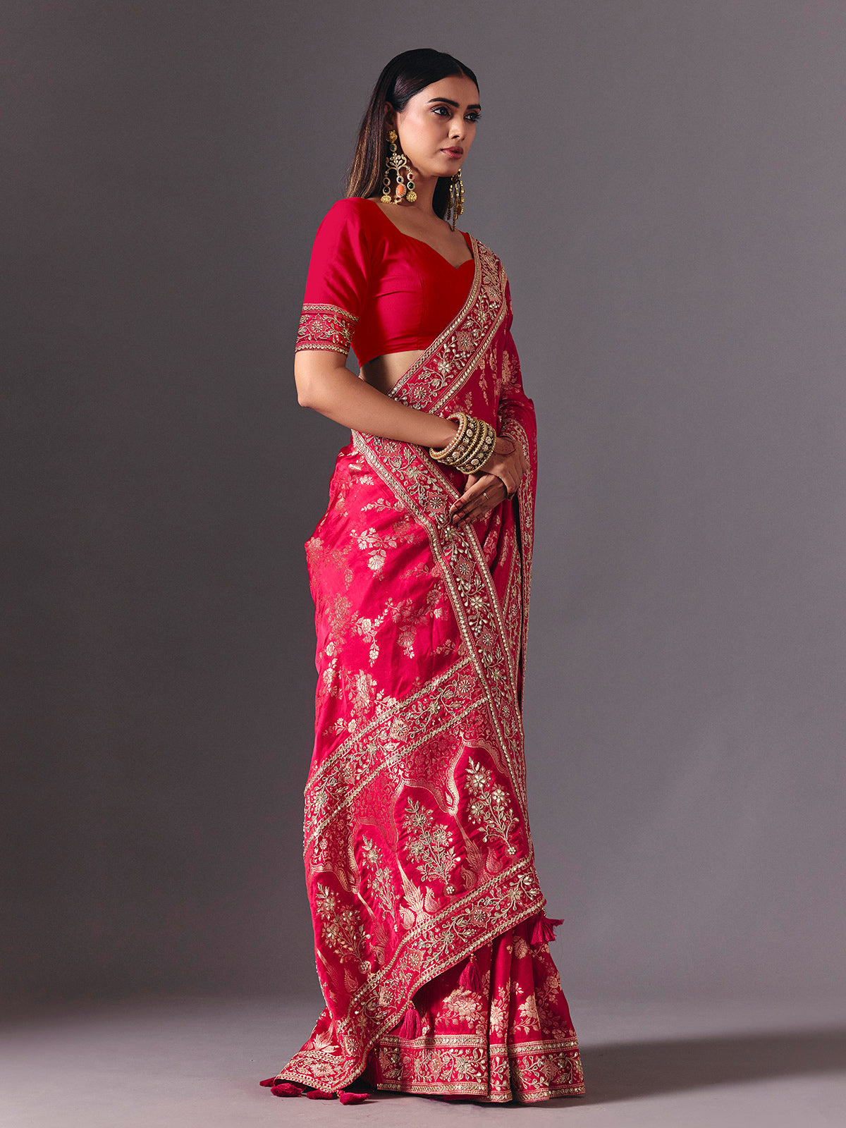 Rani pink satin silk saree with luxurious zari embellishments