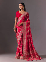 Rani pink satin silk saree with luxurious zari embellishments