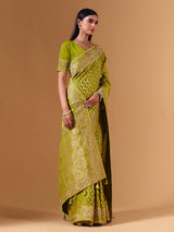 Bright green modal silk saree with dazzling zari detailing