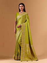 Bright green modal silk saree with dazzling zari detailing