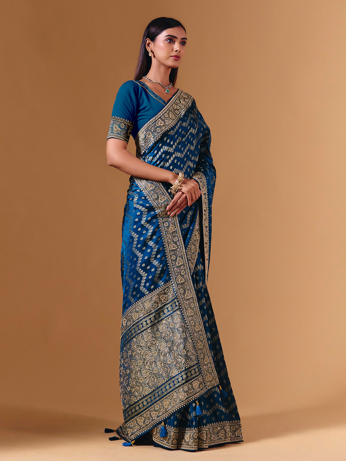 Royal blue modal silk saree with luxurious zari butti work