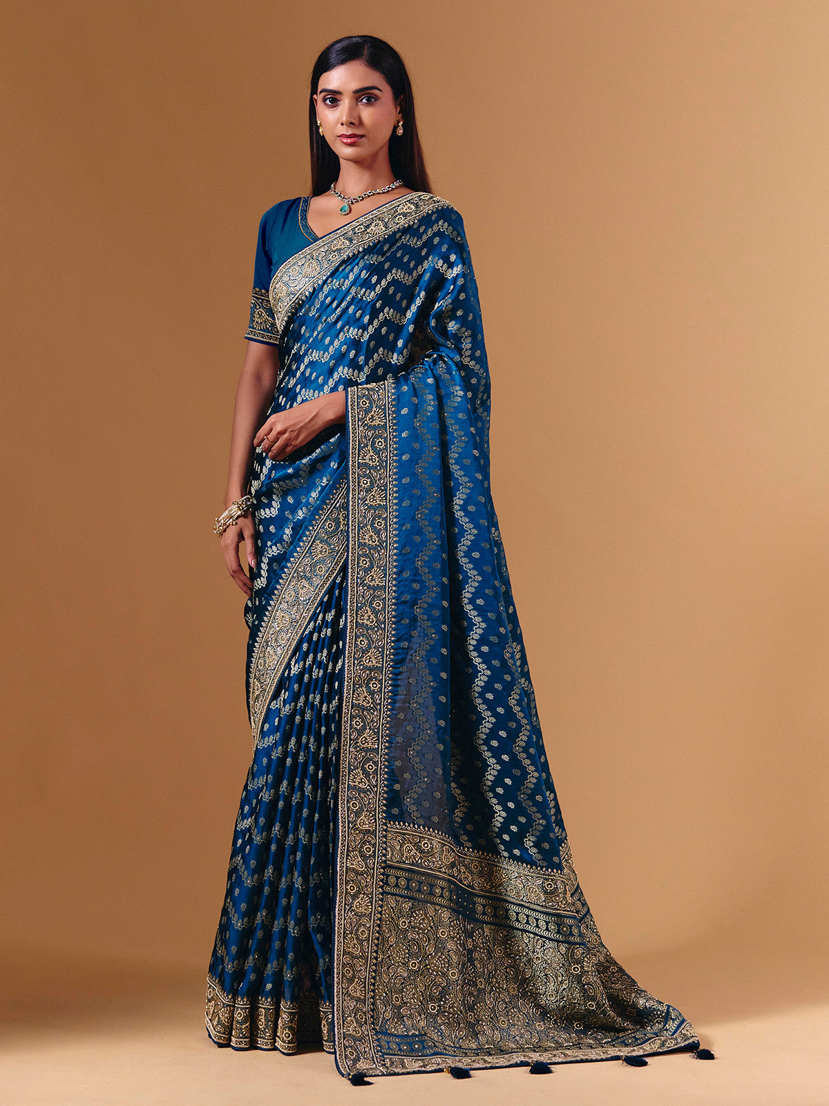 Royal blue modal silk saree with luxurious zari butti work