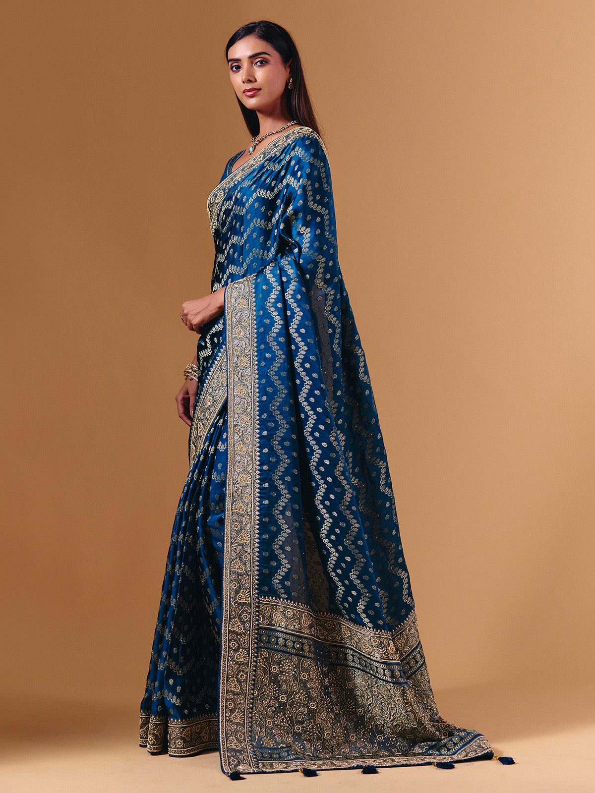 Royal blue modal silk saree with luxurious zari butti work