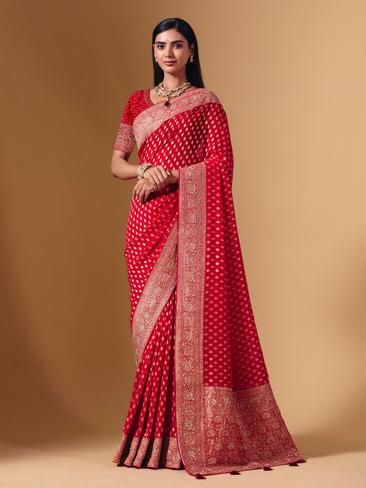 Red dola silk saree with exquisite zari butti embellishments