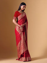 Red dola silk saree with exquisite zari butti embellishments