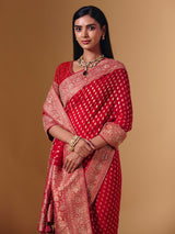 Red dola silk saree with exquisite zari butti embellishments