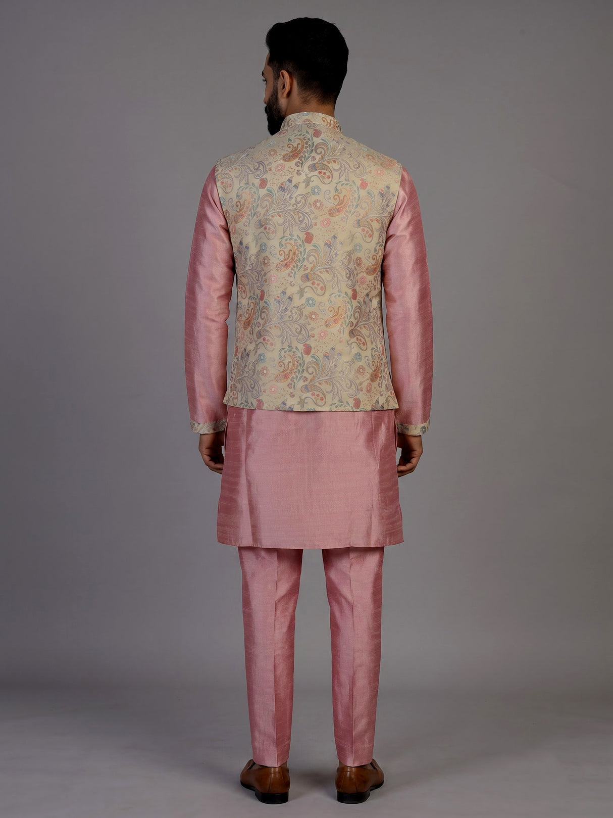 Pink silk waistcoat set for men with printed zari detailing