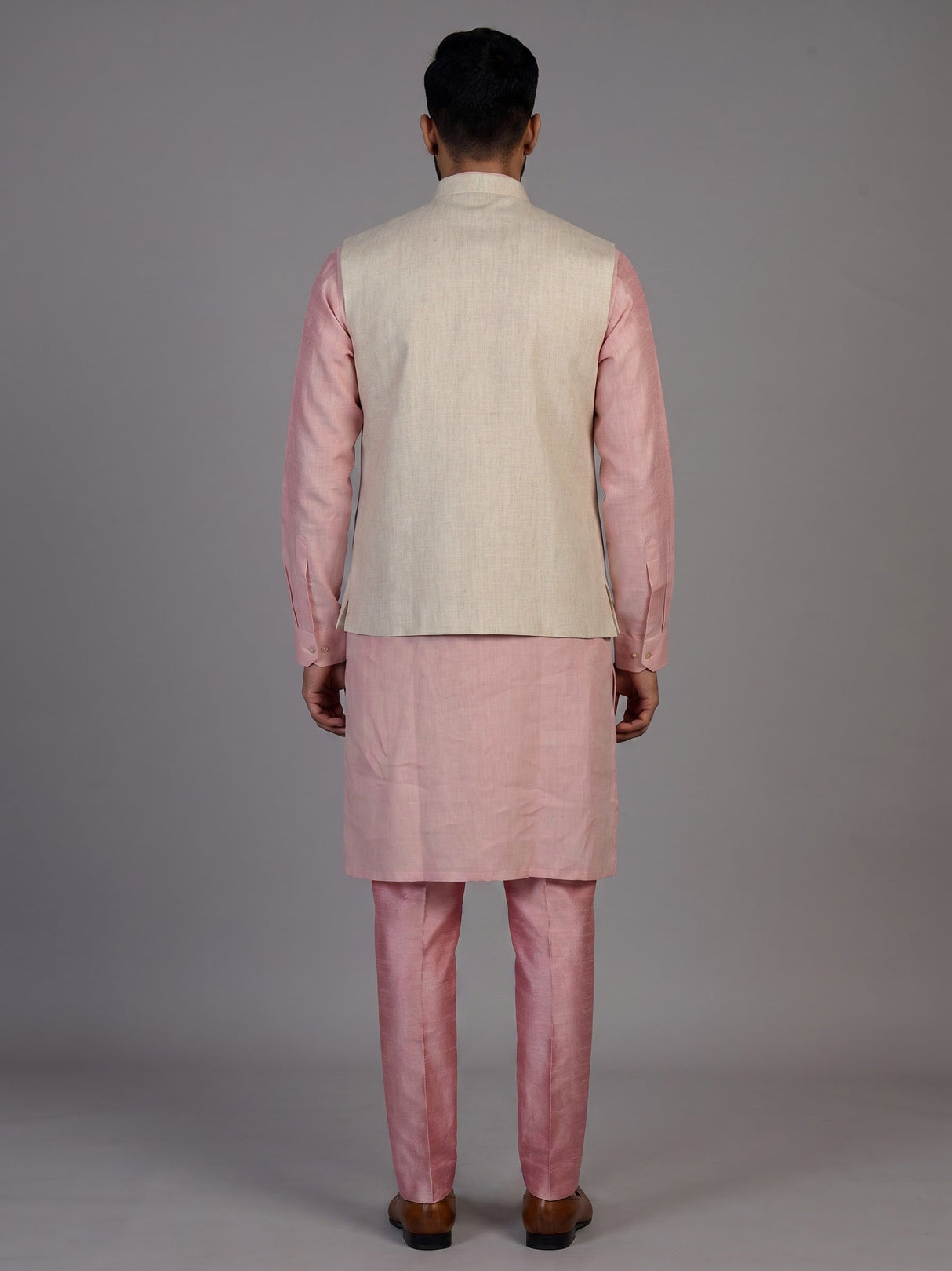 Pink linen waistcoat set for men with intricate zardosi embellishments