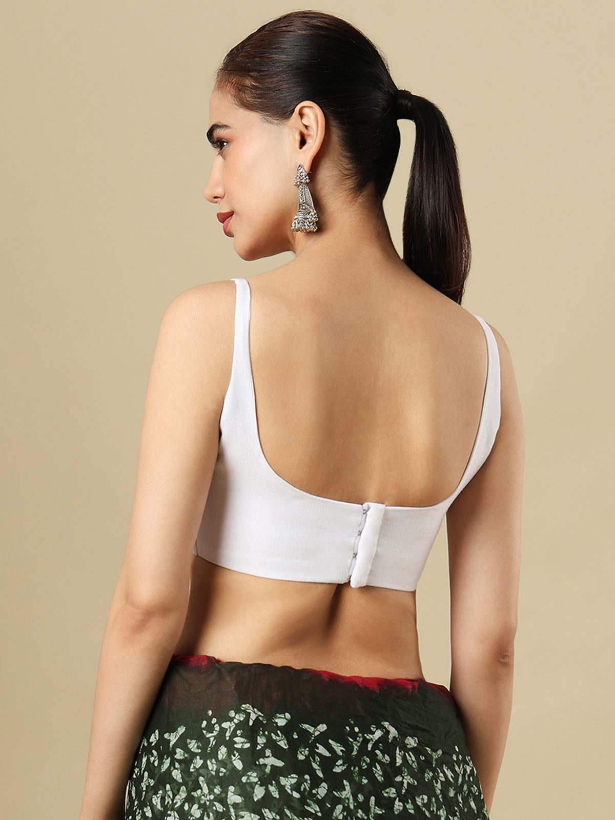White linen solid blouse with round neckline and back opening