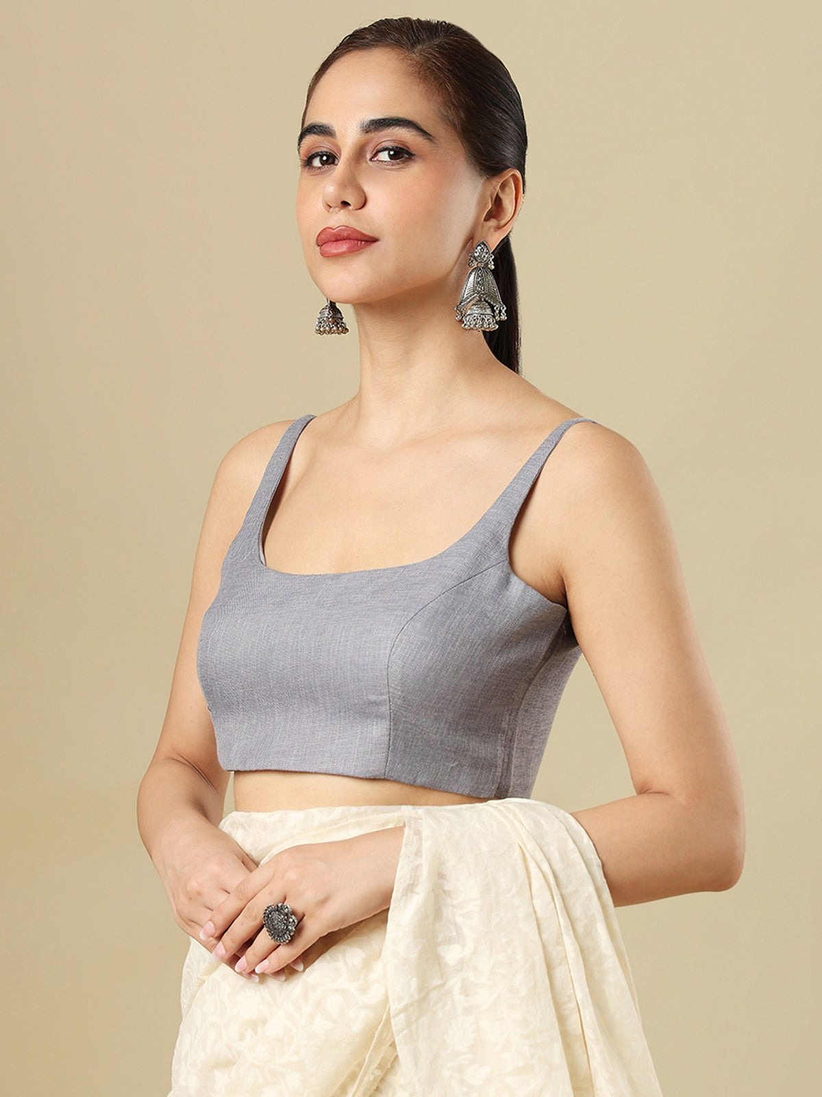 Grey linen solid blouse with round neckline and back opening