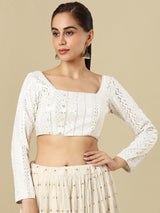 White georgette embellished blouse with square neckline and full sleeves