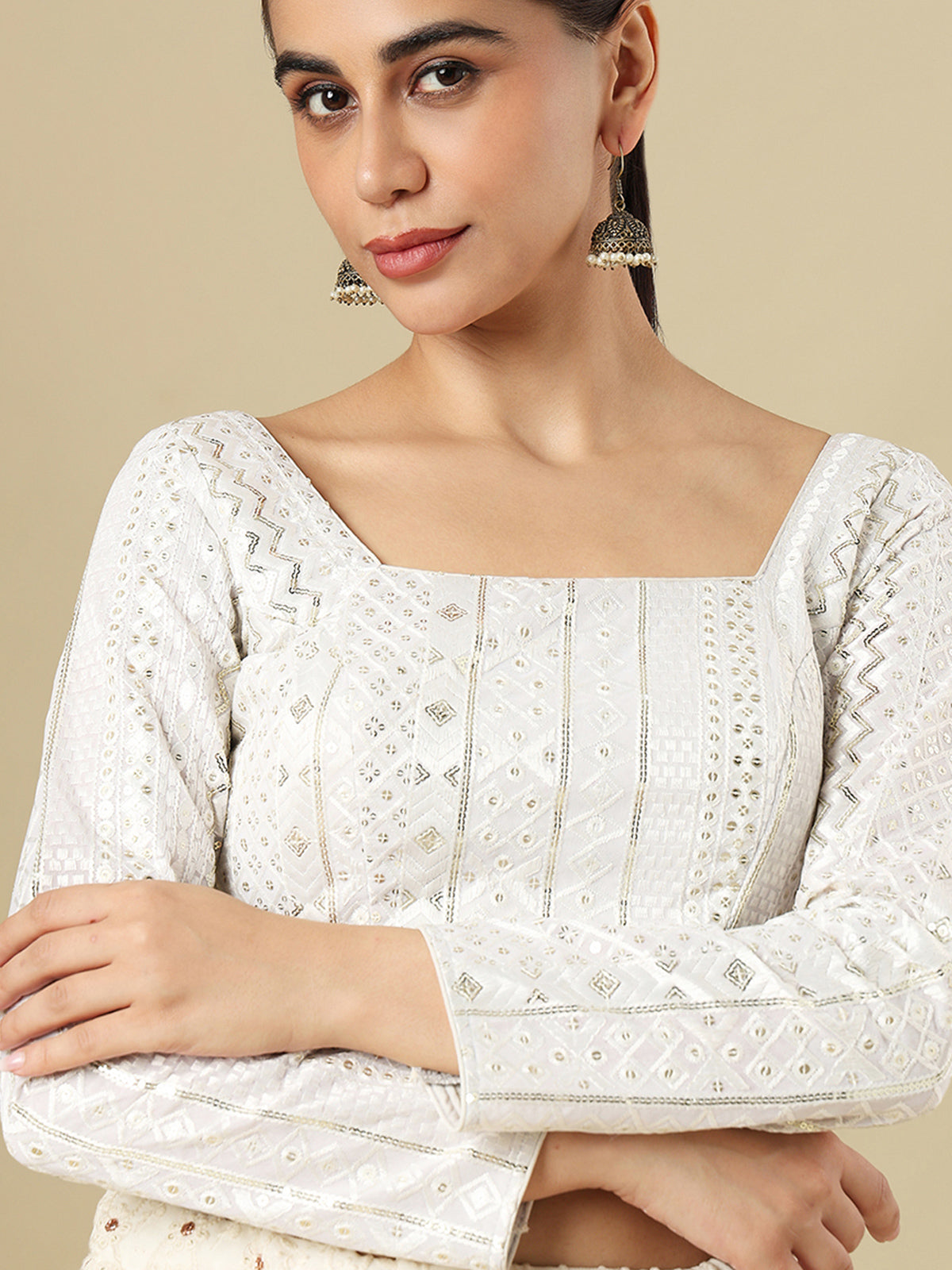 White georgette embellished blouse with square neckline and full sleeves