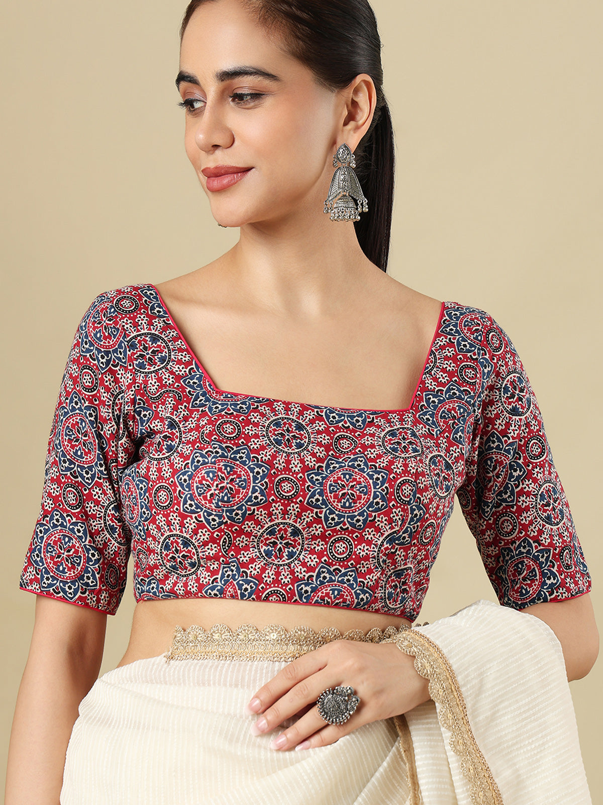 Red cotton printed blouse with square neckline and elbow sleeves