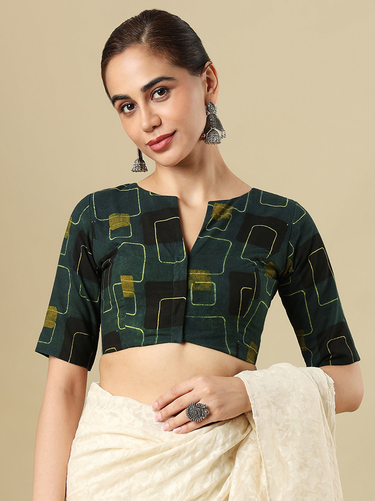 Green cotton printed blouse with boat neckline and elbow sleeves