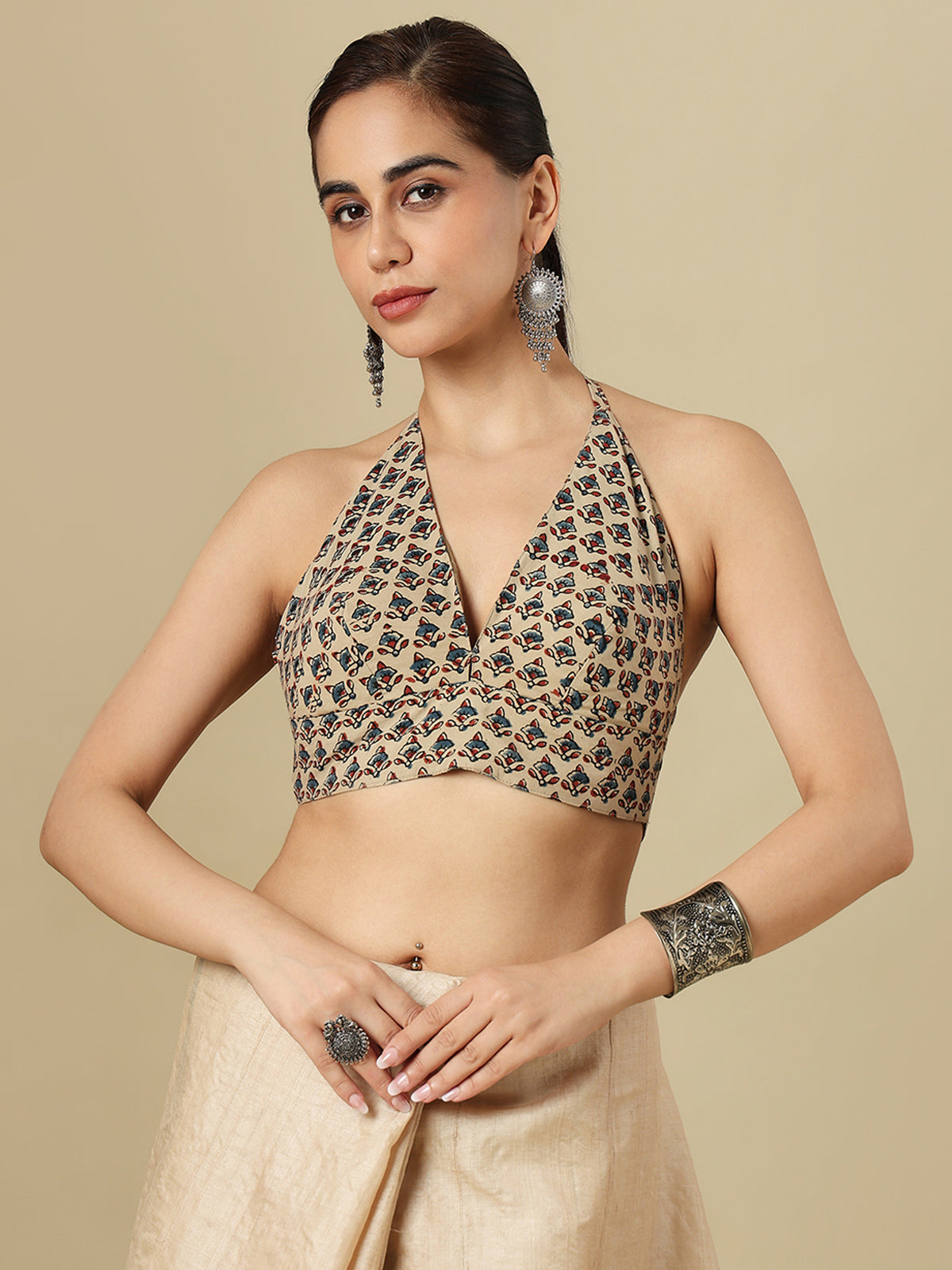 Beige cotton printed blouse with halter neckline and back opening