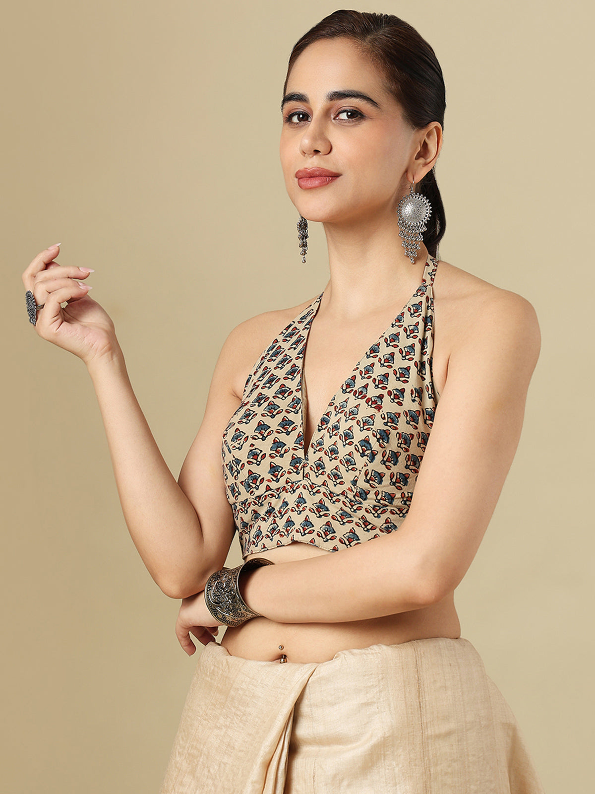 Beige cotton printed blouse with halter neckline and back opening