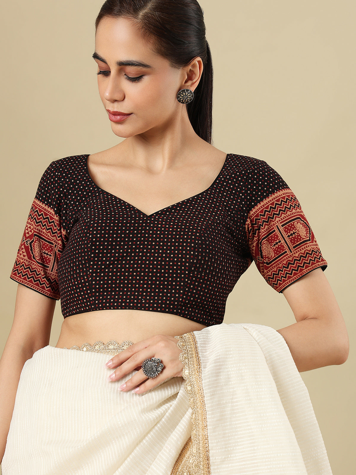Black cotton printed blouse with sweetheart neckline and half sleeves