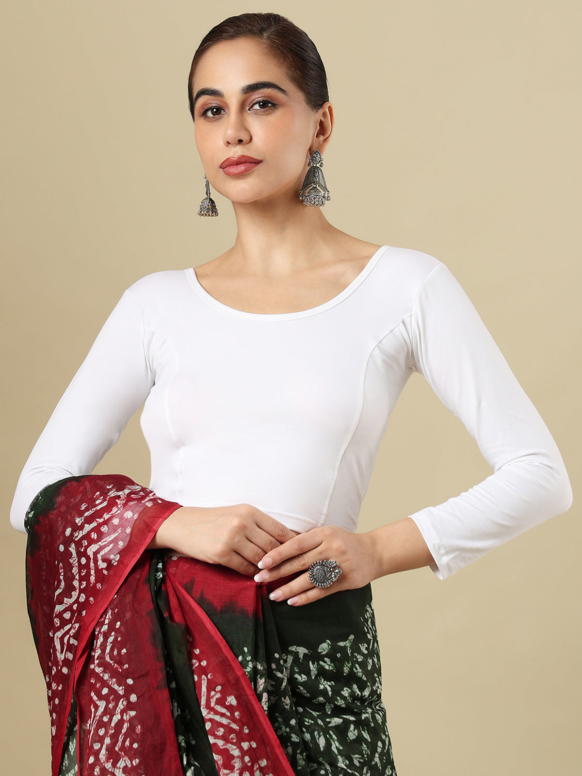 White cotton solid blouse with round neckline and quarter sleeves