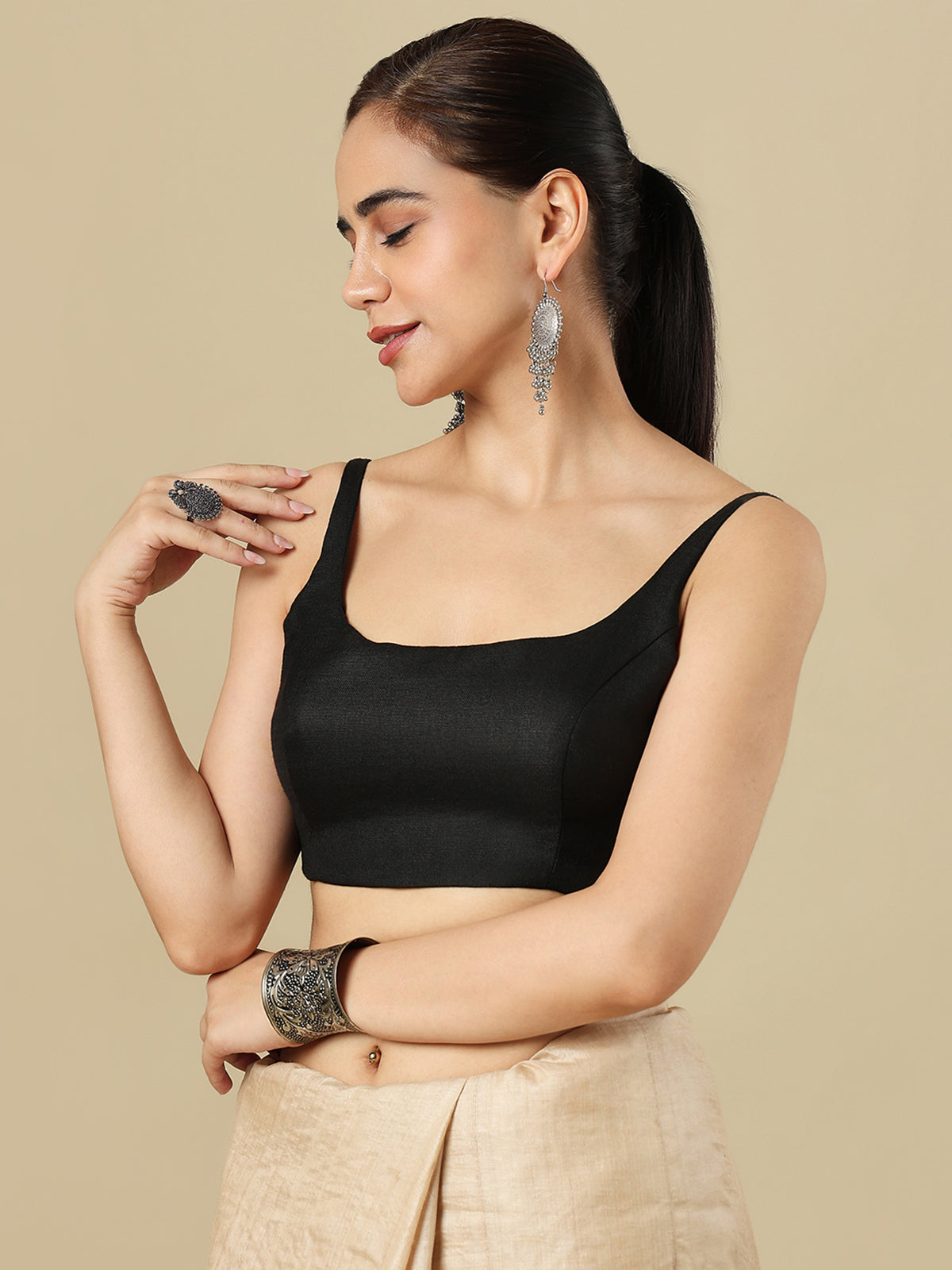 Black linen solid blouse with round neckline and back opening