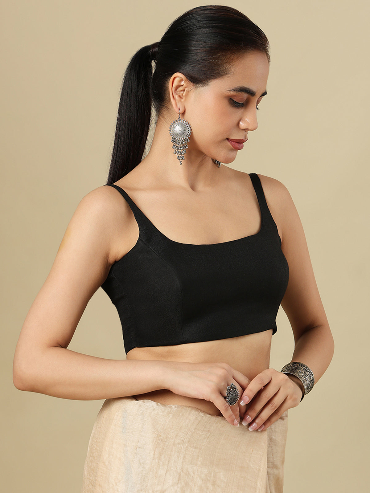 Black linen solid blouse with round neckline and back opening