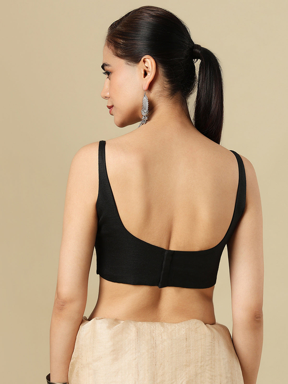 Black linen solid blouse with round neckline and back opening