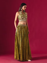 Olive green tissue silk lehenga choli with mirror and zari embellishments
