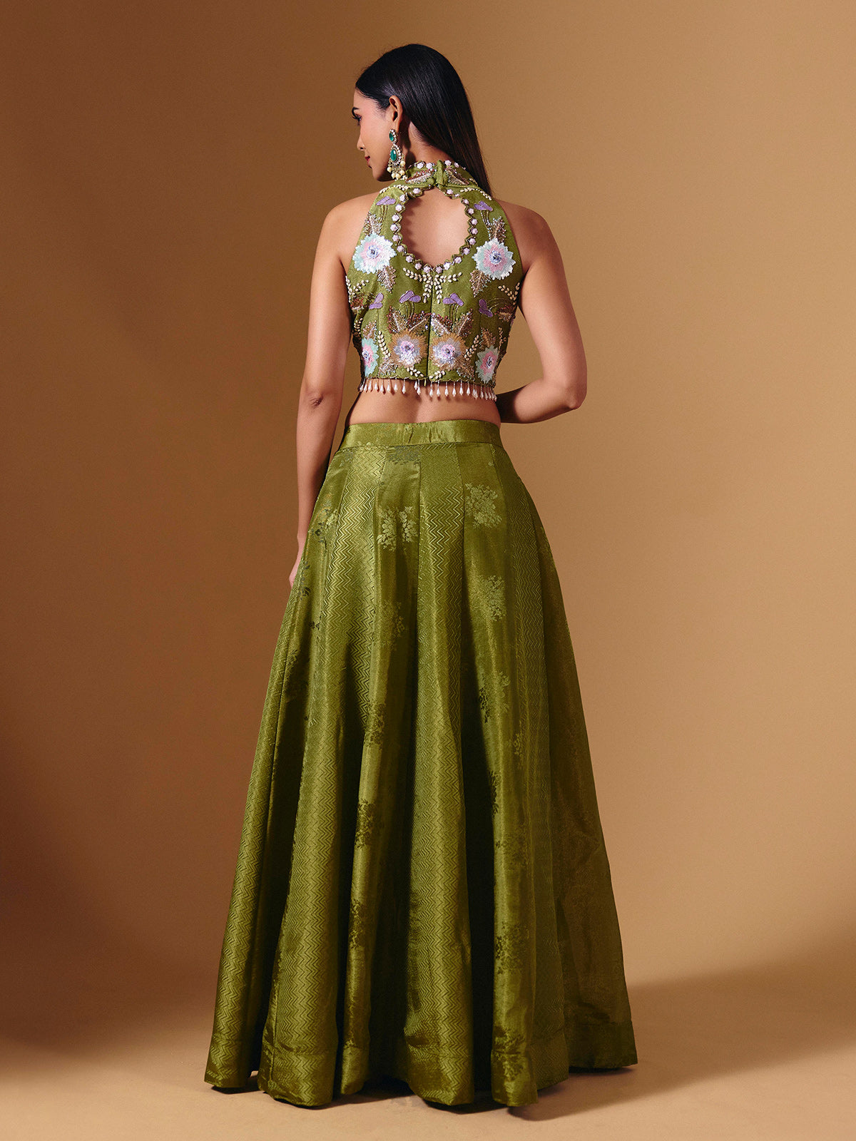 Green brocade silk lehenga choli with exquisite cutdana detailing