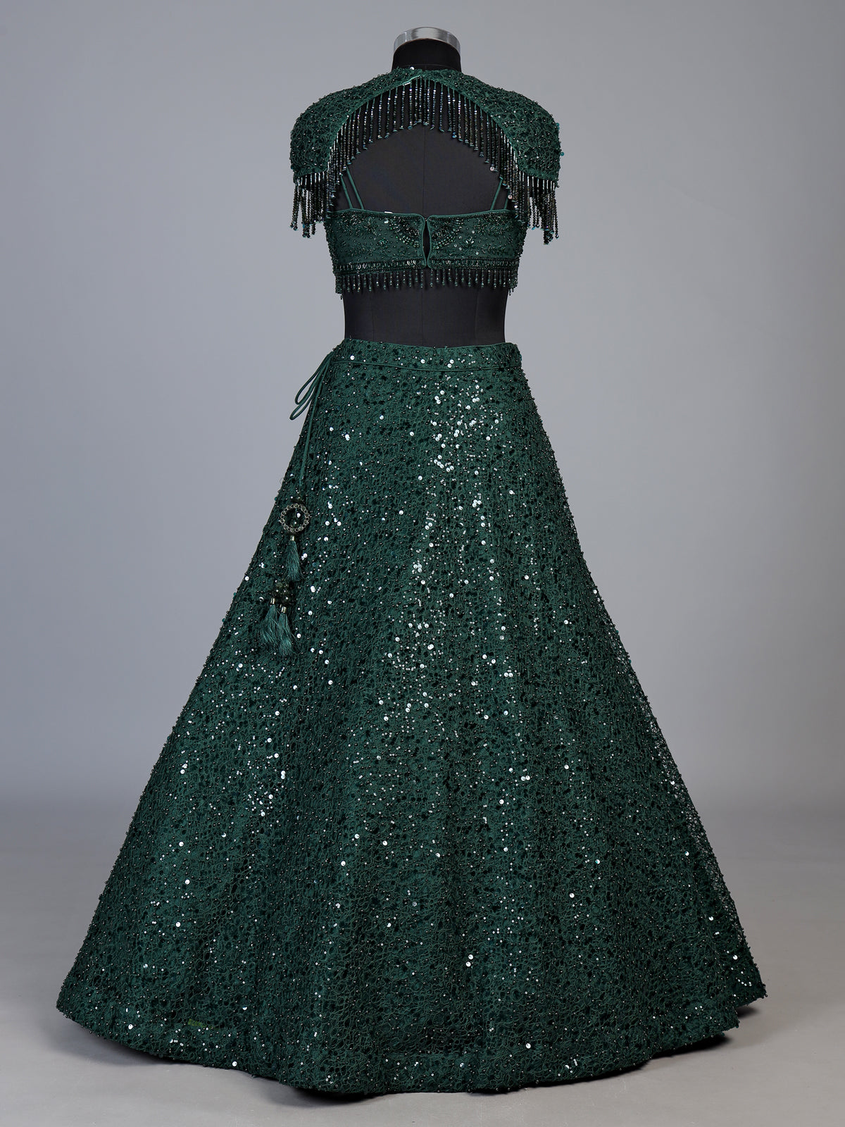 Green embellished cape lehenga choli for women