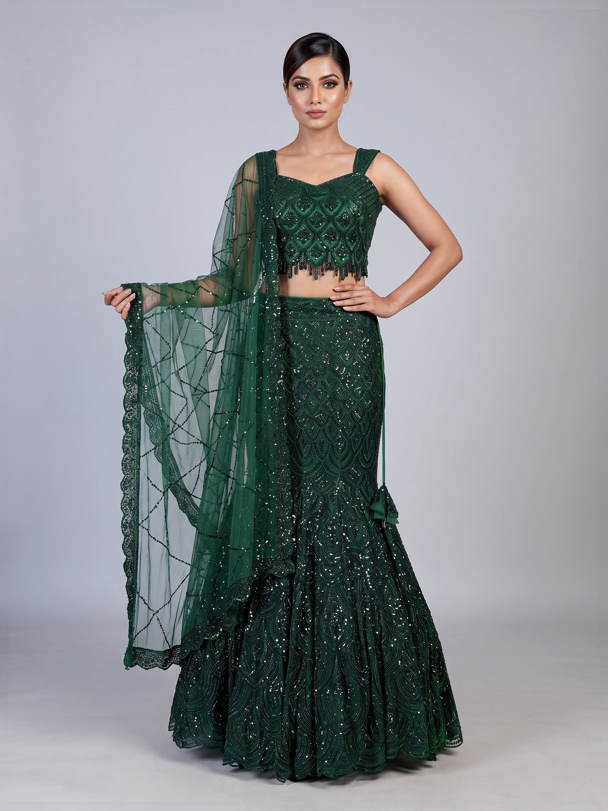 Green sweetheart tiered lehenga choli for women