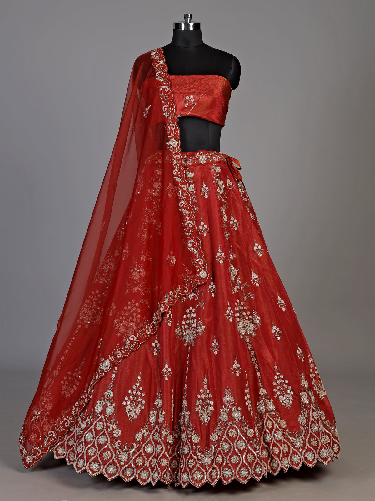 Deep rust orange silk unstitched lehenga choli with pearl zardosi work