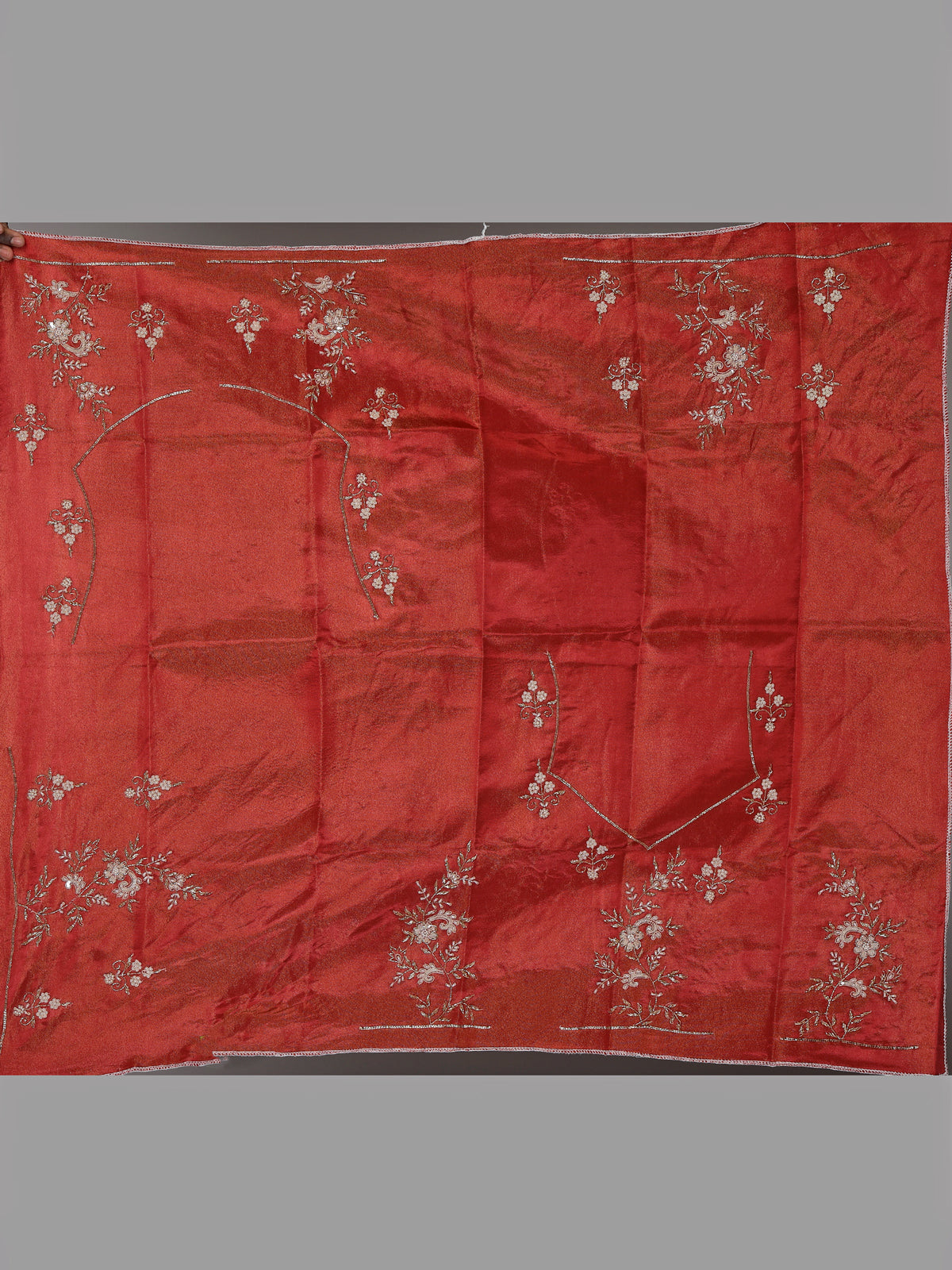 Deep rust orange silk unstitched lehenga choli with pearl zardosi work
