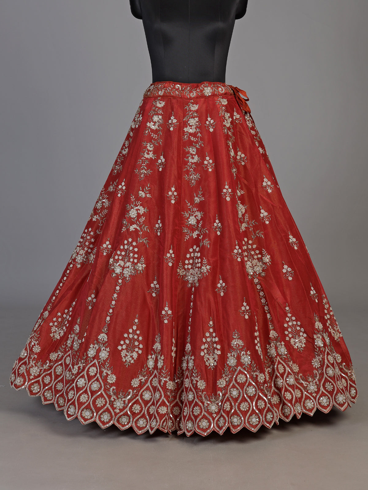Deep rust orange silk unstitched lehenga choli with pearl zardosi work