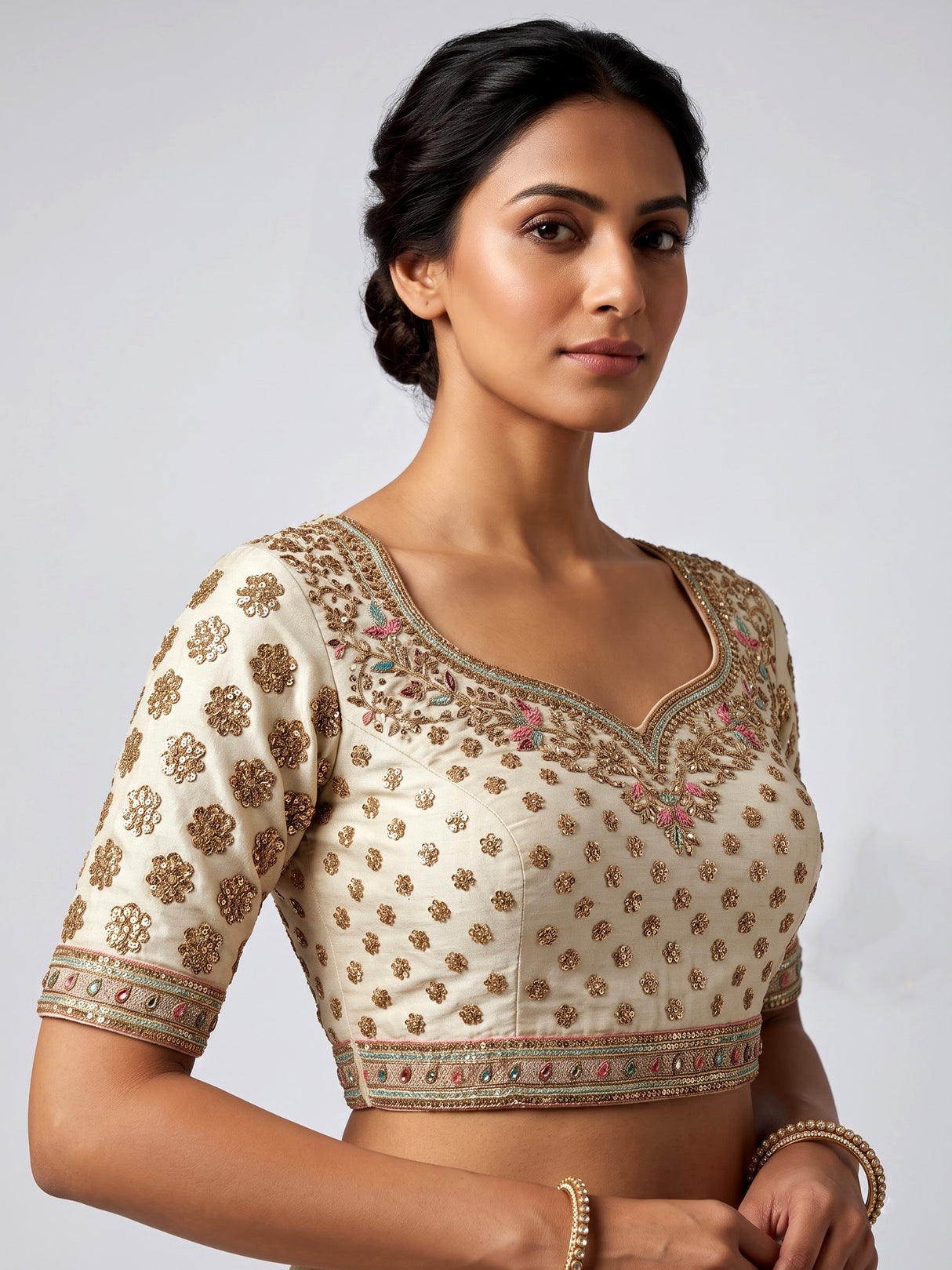 Cream silk unstitched lehenga choli with elegant butta embellishments