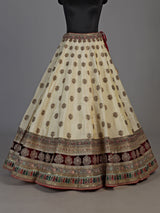 Cream silk unstitched lehenga choli with elegant butta embellishments