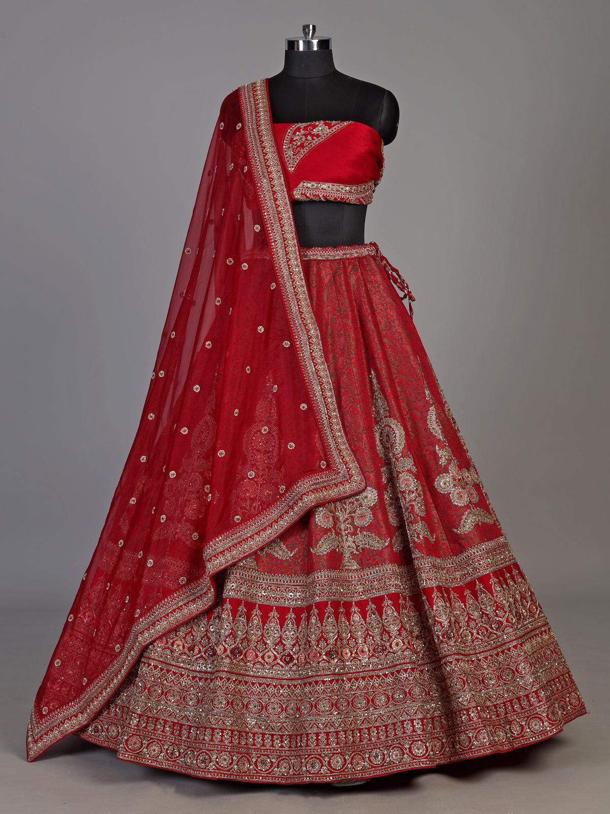 Red silk blend unstitched lehenga choli with pearl embellishments