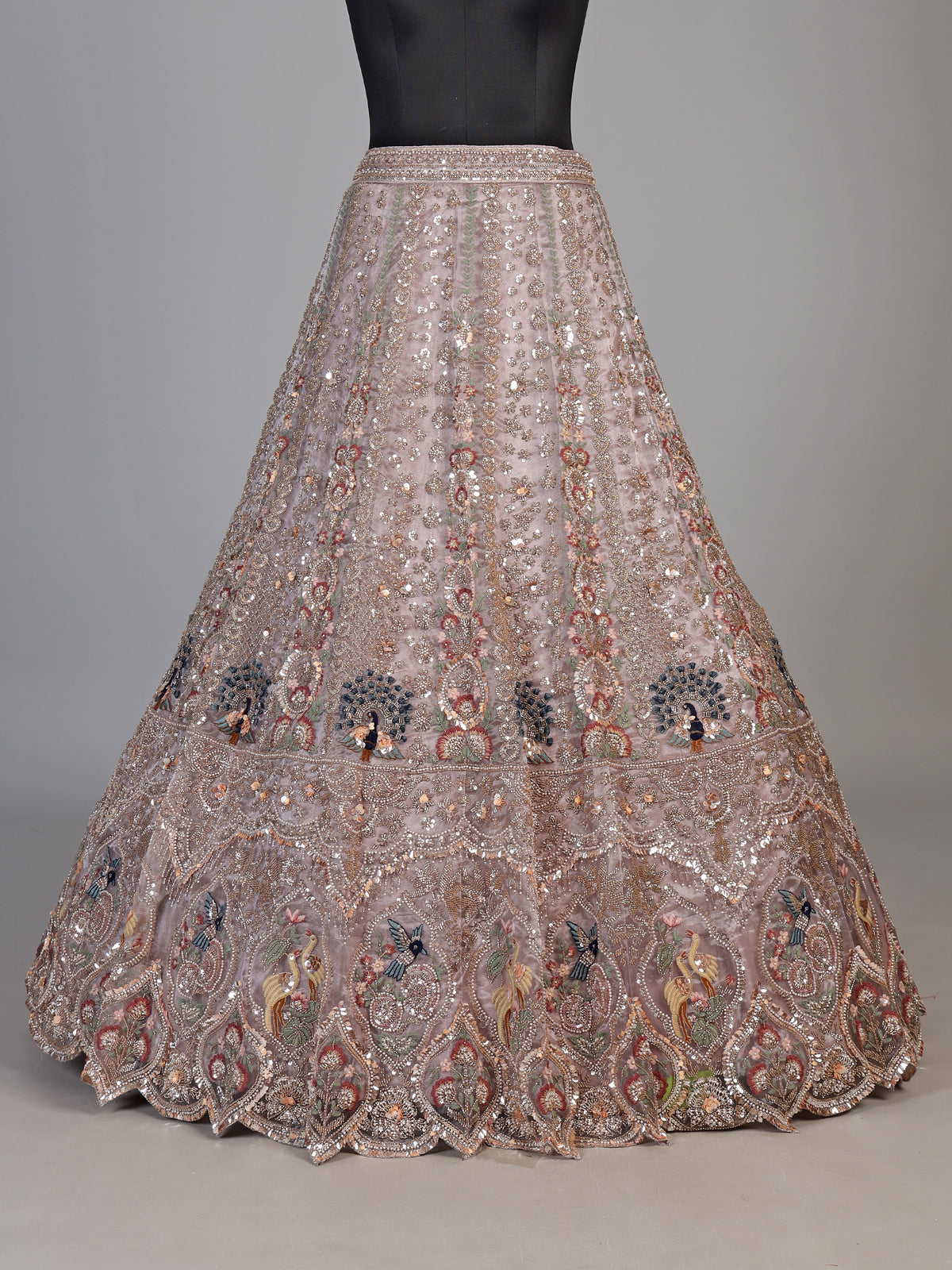 Dusty pink tissue organza unstitched lehenga choli with bird motifs