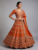 Rust orange raw silk unstitched lehenga choli with pearl accents