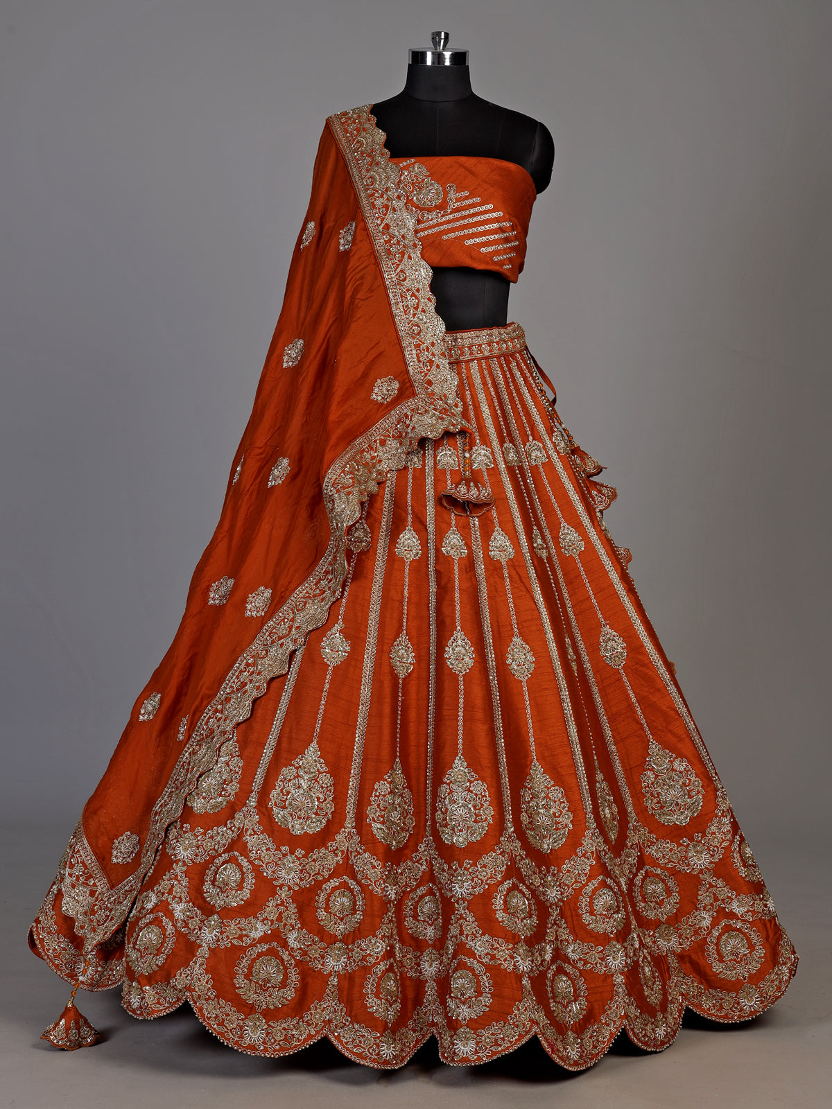 Rust orange raw silk unstitched lehenga choli with pearl accents