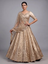 Beige silk unstitched lehenga choli with exquisite zardosi artistry